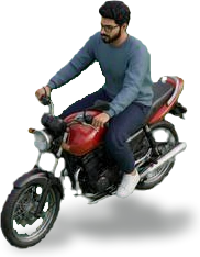 Miniature Suhruth riding a geared motorbike
