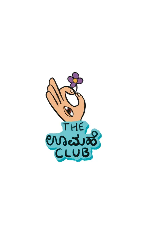 A hand holding a small purple flower with an eye in its palm, above a blue badge reading THE, a Kannada word, and CLUB.
